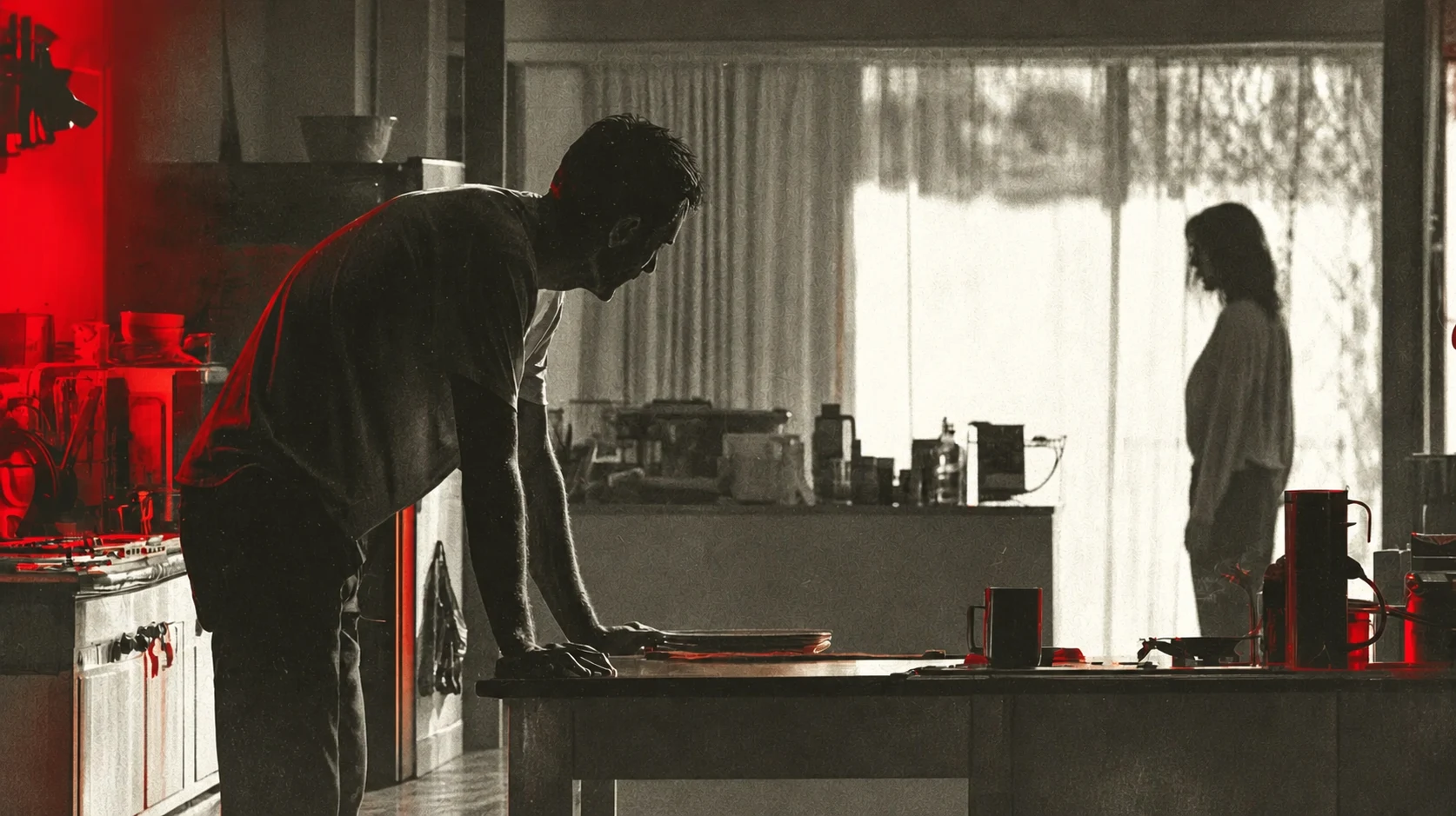A man sitting alone at home under relationship pressure